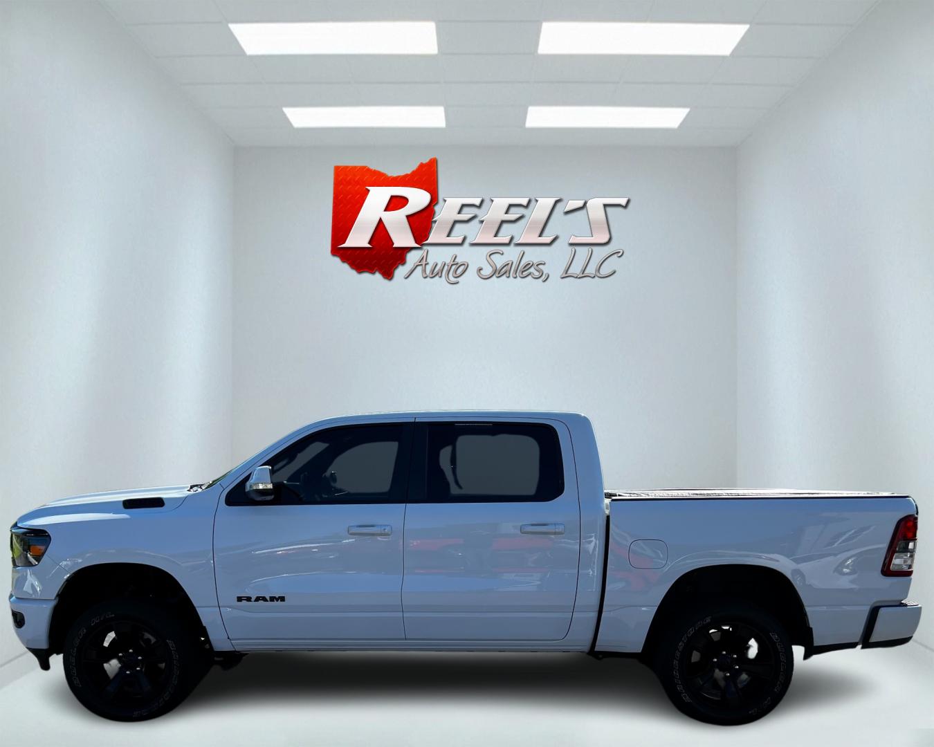 2020 White /Black RAM 1500 Big Horn Crew Cab SWB 4WD (1C6SRFFT9LN) with an 5.7L V8 OHV 16V engine, 8-Speed Automatic transmission, located at 11115 Chardon Rd. , Chardon, OH, 44024, (440) 214-9705, 41.580246, -81.241943 - This 2020 Ram 1500 Big Horn Crew Cab 4WD is powered by a 5.7L HEMI V8 engine with 395 horsepower and 410 lb-ft of torque, mated to an 8-speed automatic transmission and 3.21 gearing. It features a robust towing capacity of 8,190 pounds and a payload capacity of 1,742 pounds. This model includes fron - Photo#9